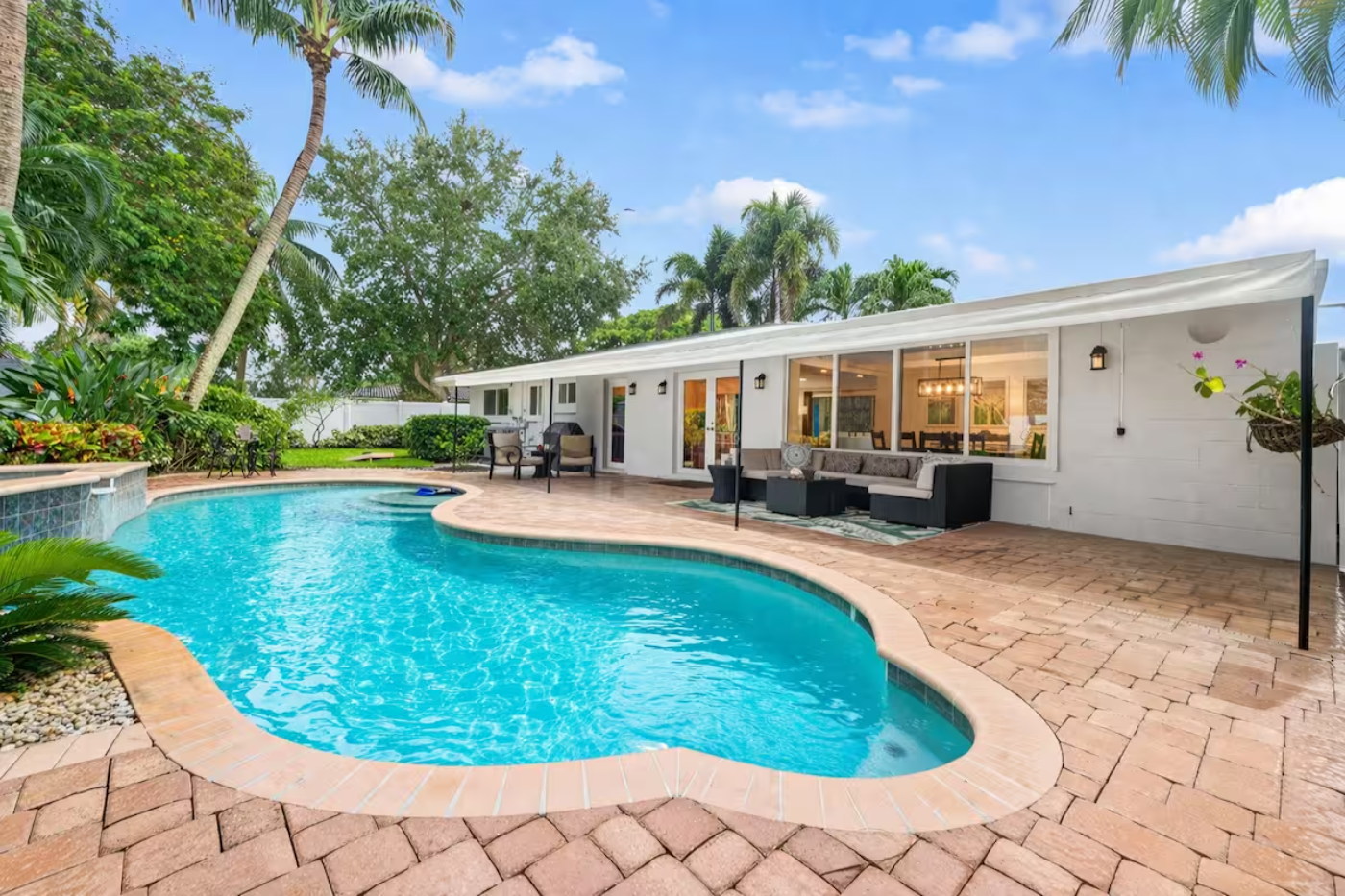 Heated swimming pool at a tropical South Florida vacation rental